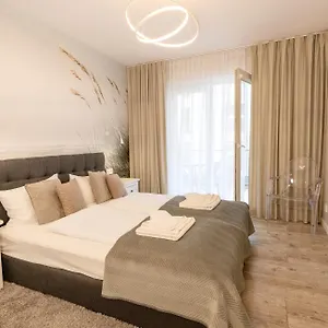 https://apartament-przy-latarni-morskiej.kolobrzeghotels.com